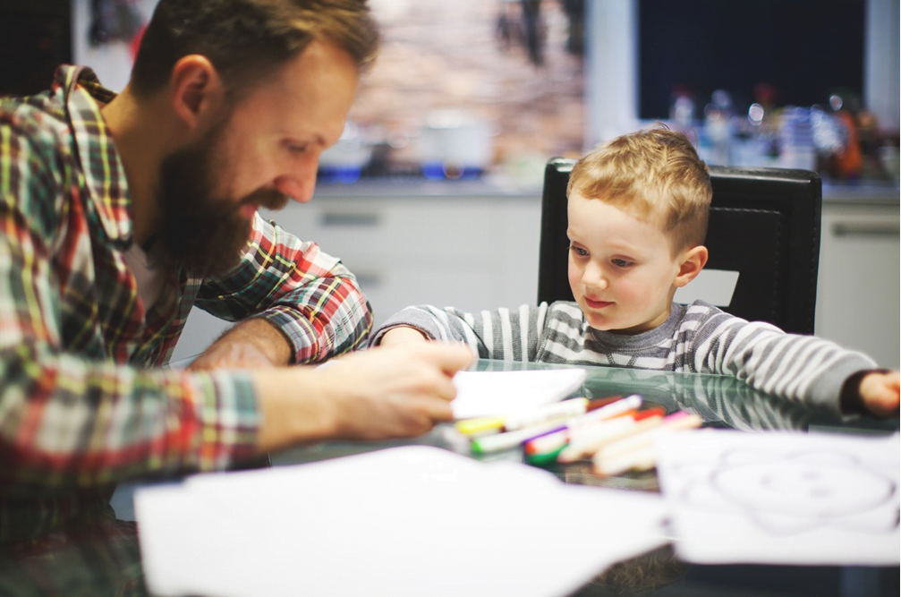 picture of a man and child coloring