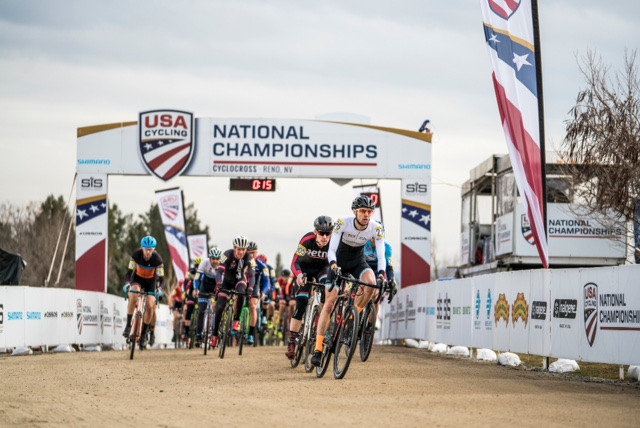 Picture of cyclists at the starting line just taking off