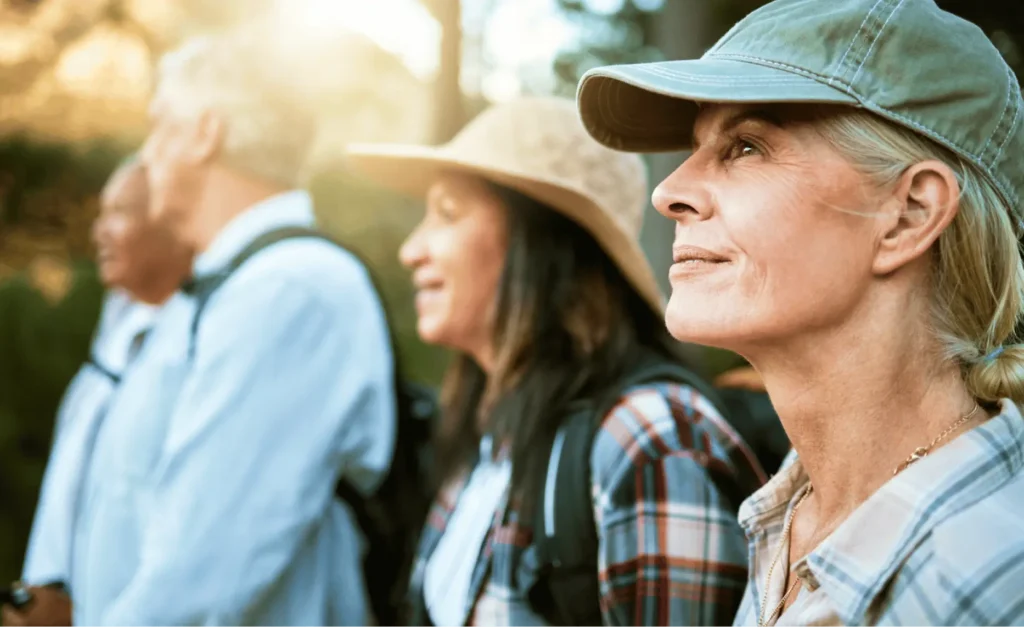 Closeup of mature retired people on a journey for outside discovery.