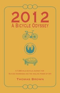 The cover of the book 2012 A BICYCLE ODYSSEY A 7,000 MILE BICYCLE JOURNEY FOR SUICIDE AWARENESS AND THE HEALING POWER OF ART